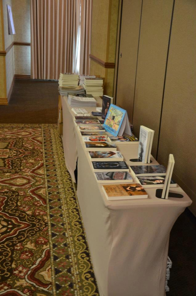 The book table full of books for sale at the Rhemalda Publishing Got Stories Conference in Salt Lake City, Utah.