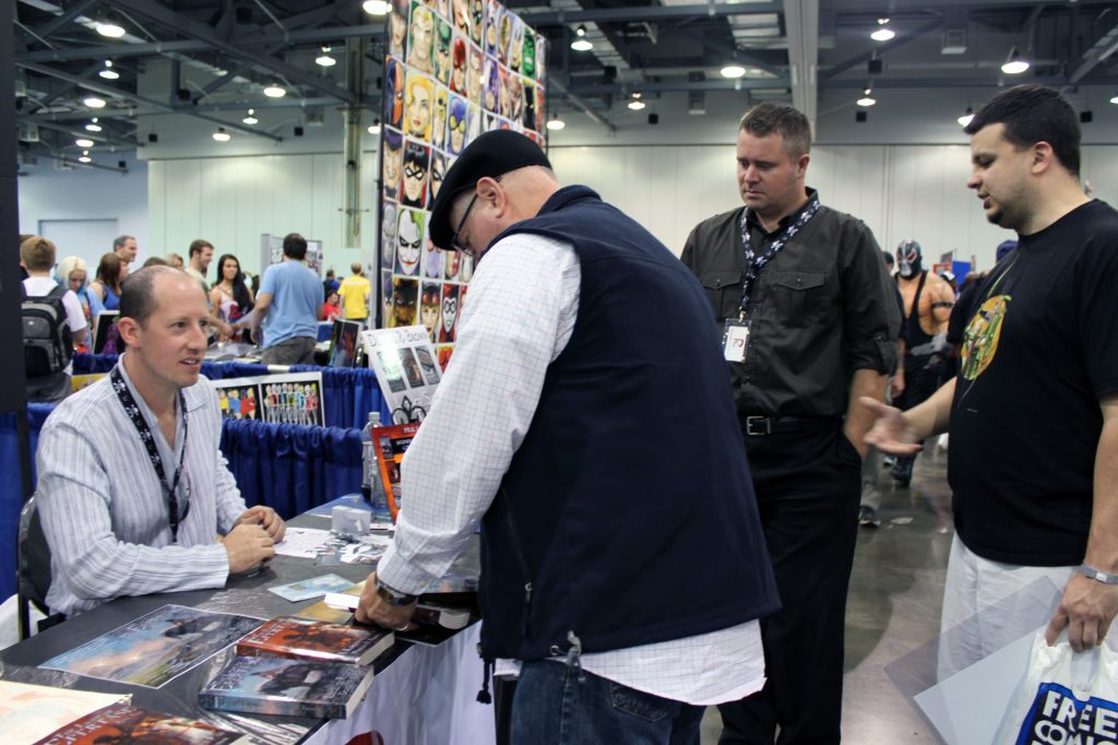 Author Douglas Brown in Columbus Ohio signing books at comic-con.