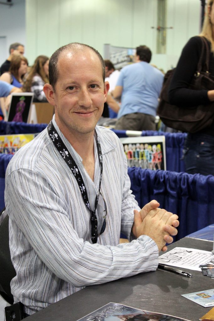 Author Douglas Brown in Columbus Ohio signing books at comic-con.
