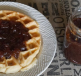 An image of a thick layer of delicious Apple Butter spread on a waffle.
