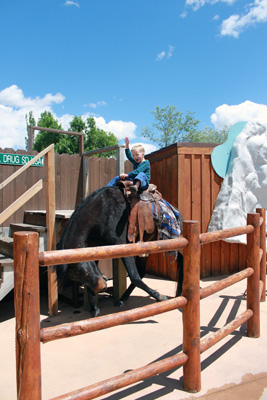 DEH riding a bronc at Wall Drug in South Dakota.