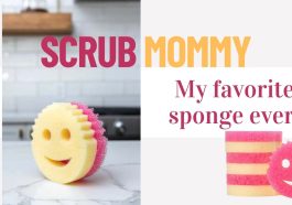 A Scrub Mommy Sponge in the center of a marble kitchen counter.